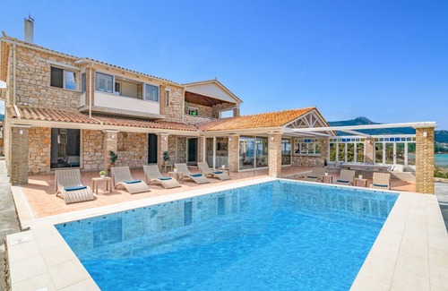 Ano Vasilikos Villa | Villa Ionio Beach House by Villa Plus