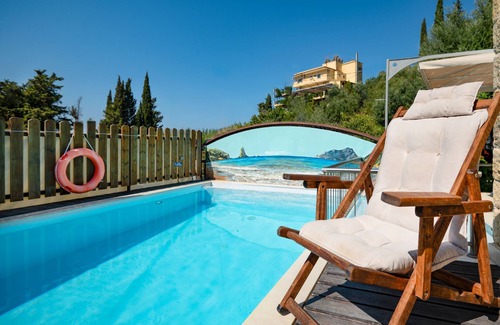 Agios Gordios Villa | Villa Kadith: Renovated, pool, near beach, A/C, WiFi, Parking