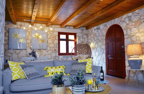 Akrotiri Villa | Villa Nephele of Jootiq Villas. Combine traditional stone built concept with supreme comfort!
