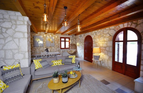 Akrotiri Villa | Villa Nephele of Jootiq Villas. Combine traditional stone built concept with supreme comfort!
