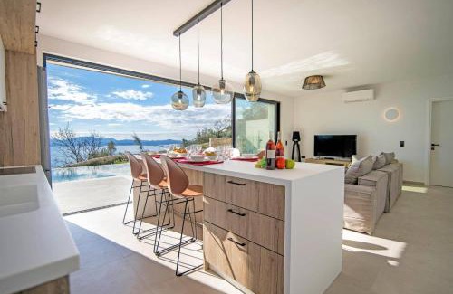 Petaleia Villa | Villa Nissaki View 2 by Villa Plus