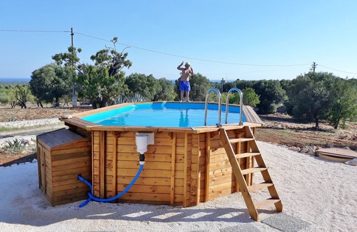 Ostuni Villa | Villa of 4 conical roofs (trullo), fully renovated in big property. Sea view