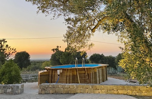 Ostuni Villa | Villa of 4 conical roofs (trullo), fully renovated in big property. Sea view
