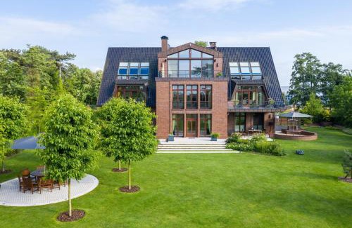 Hohe Dune Apartment | Villa Schmidt - Strandhaus direkt am Meer mit Sauna, Sport und Dünengarten I
