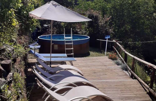 Bagni di Lucca Villa | Villa with 6 double bedrooms and 5 bathrooms.River views, pool and walk to town