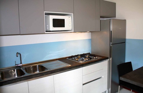 Lignano Pineta Villa | Villa with air conditioning, pool, terrace and garden