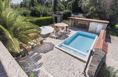 Savudrija Villa | Villa with heated pool on the edge of an olive grove overlooking the sea