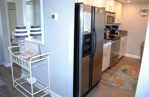 Litchfield by the Sea Condo | Villa with marsh views and pool access located within gated Litchfield By the Sea community.