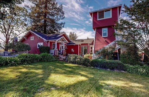Graton House | Vineyard property with a 1910 Farmhouse and Water Tower