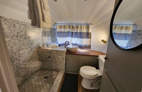 Mill Spring House | Vintage 1971 Airstream on the creek, easy access to pool and playground, sleeps 2.