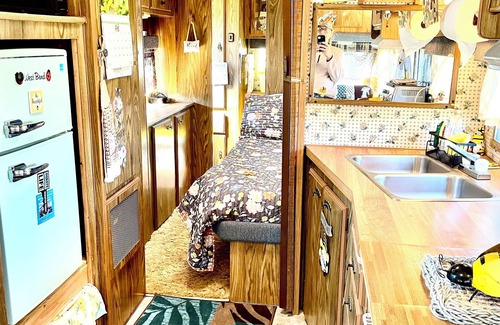Farmersville Station House | Vintage camper with fabulous views of the rolling hills of Western New York