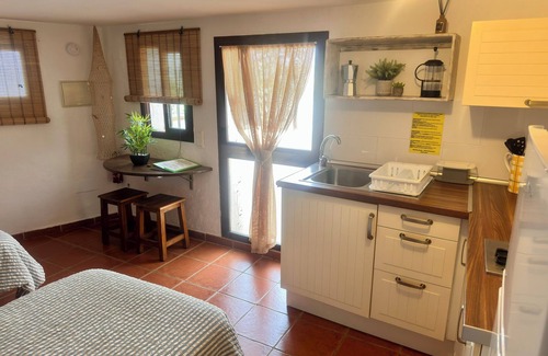 Benamocarra Apartment | Viñuela Hideaway - Your Mountain Studio with Kitchen & Pool