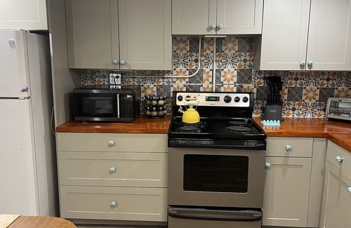 Ball Ground Cottage | Visit cozy Byrd Hill Cottage nestled on a quiet street- short walk to downtown.