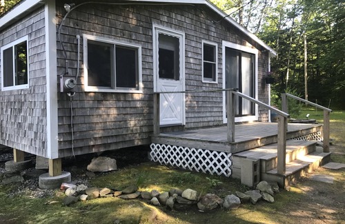 Winthrop Cabin | Walk out beach in private cove on Cobboossee Lake