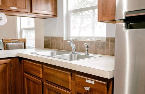 Sekiu Apartment | Walk out the front door, across a grass lawn and onto a sandy beach