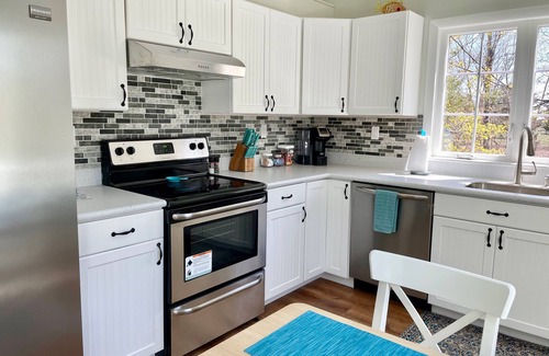 Madison Apartment | Walk to Beach! Modern Carriage House - Near Town - Deck, Fire Pit & Grassy Lawn