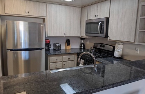 Hermosa Village Condo | Walk to Disney, hot tub, strollers! 1 Parking Spot