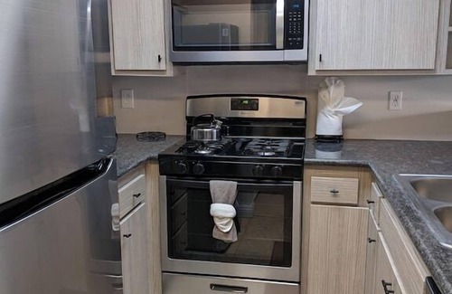 Hermosa Village Condo | Walk to Disney, hot tub, strollers! 1 Parking Spot
