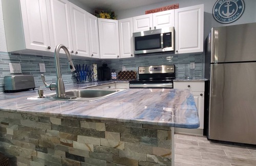 Englewood Apartment | WALK TO GULF BEACH ACCESS! Coastal Studio – Starfish Stays 2C Dog Friendly.