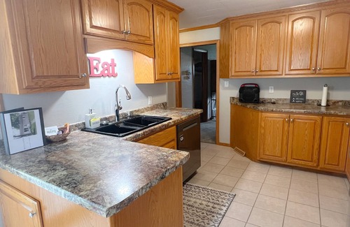 Green Bay House | Walk to Lambeau Field! Cozy 2 bedroom, 1 bath. Sleeps 8