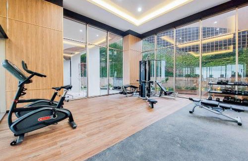 Ciputat Apartment | Warm and Minimalist Studio Transpark Bintaro Apartment By Travelio