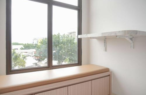 Ciputat Apartment | Warm and Minimalist Studio Transpark Bintaro Apartment By Travelio