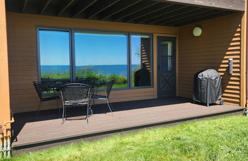 Two Harbors Condo | Water's Edge! Direct shoreline access; Condo with resort-like amenities