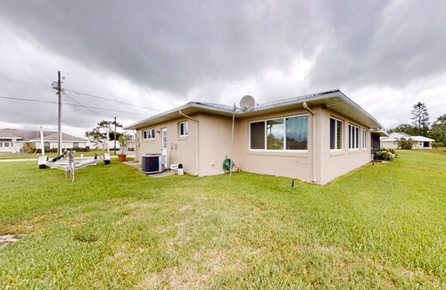 Placid Lakes House | Water-view dog-friendly home with dock, electric grill, fast WiFi, water access