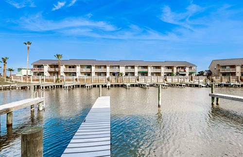 Harbor Oaks House | Water-view townhouse with boat slip, shared pools, near beaches
