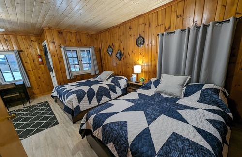Park Rapids Apartment | Waterfrnt resort Studio Cabin 5, swim, kayak, walk to everything!