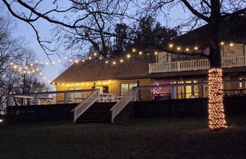 West Livingston House | Waterfront 4-bedroom estate with Indoor Pool and covered fishing dock Fire Pit