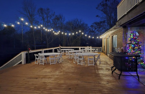 West Livingston House | Waterfront 4-bedroom estate with Indoor Pool and covered fishing dock Fire Pit