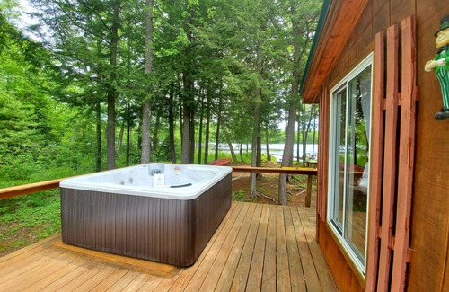 Bryant Pond Cabin | Waterfront and Mountain view a HOT TUB, Unlimited KARAOKE and Pet Friendly!
