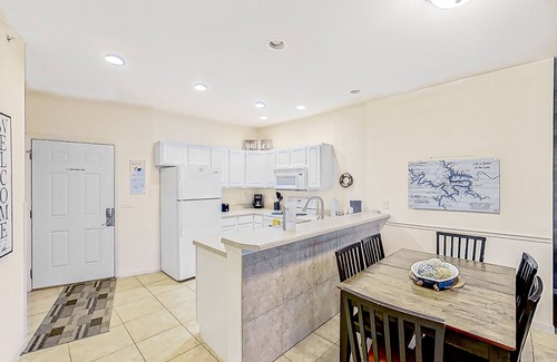 Osage Beach Condo | Waterfront condo with pool, children's items, W/D, & AC - snowbird-friendly