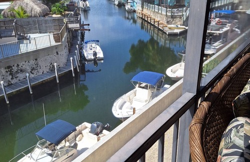 Cross Key Waterways Condo | Waterfront Condo with Boat; Great for Families, Fishing, Diving and Cruising!