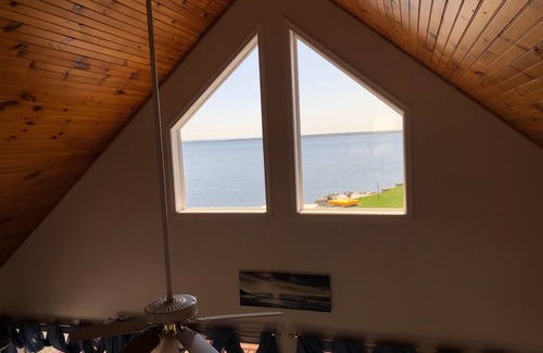 Three Mile Bay Cottage | Waterfront Cottage, Palm Tree Pointe, private space right on the water.
