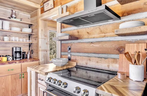 Nunnelly Cabin | Waterfront Designer Cabin w/Dock, Decks, Hot tub and Fire Pits.