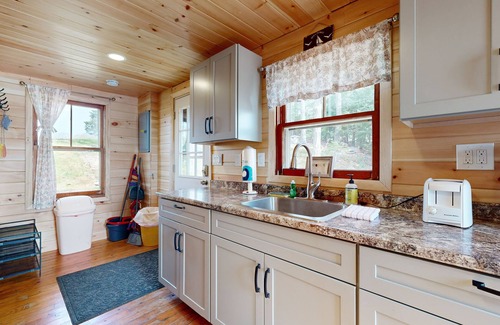 South China Cabin | Waterfront, dog-friendly cabin on China Lake with dock, canoe & firepit
