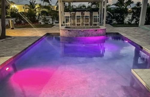 Treasure Cay House | WATERFRONT FAMILY COMPOUND 3 HOMES SLEEPS 30 WITH POOL, 3 BOAT SLIPS