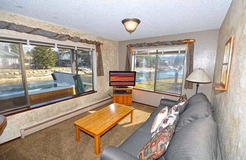 Tahoe Keys House | Waterfront Home with Mountain Inspired Decor, Private Hot Tub and Boat Dock.