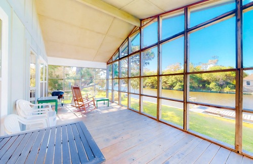 Brigands' Bay House | Waterfront home on a scenic canal with a dock, screened porch & fast WiFi