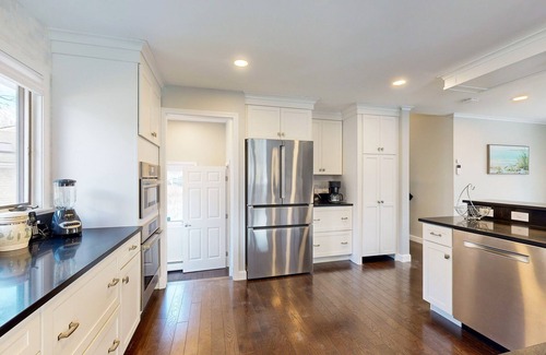 East Falmouth House | Waterfront home with firepit, grill, open layout, smart TVs, deck, W/D, & AC