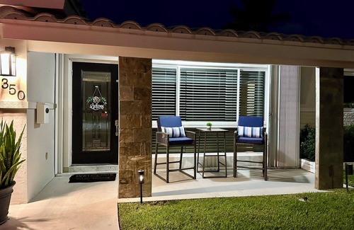 Garden Isles House | Waterfront home with private backyard. Heated pool with waterfall Jacuzzi
