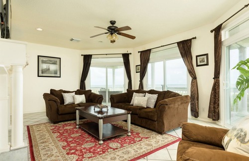 Miramar House | Waterfront home w/ wraparound deck, patio, & private beach access - two dogs OK