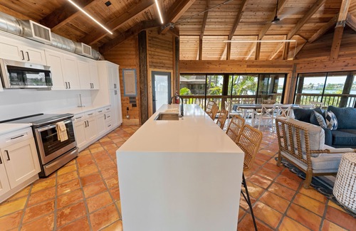Longbeach Village House | Waterfront home with private beach, a private pool, and water activities! Moku