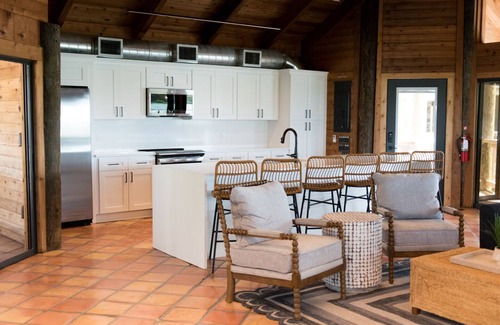 Longbeach Village House | Waterfront home with private beach, a private pool, and water activities! Moku