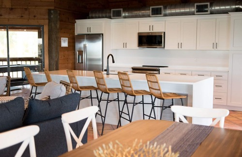 Longbeach Village House | Waterfront home with private beach, a private pool, and water activities! Moku