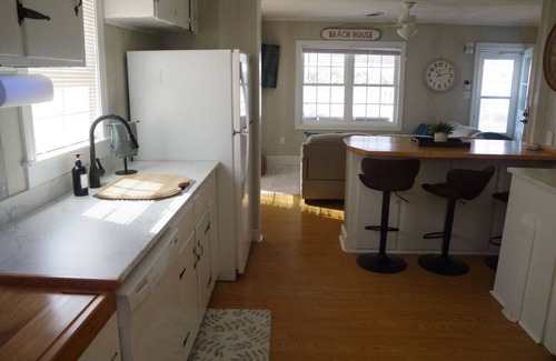 Cedar Point House | Waterfront Home with a private dock, hottub, and 3 miles to the beach