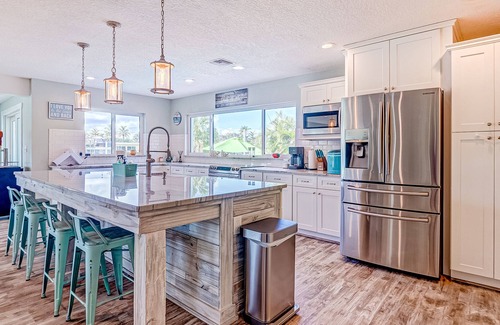 Cocoa Isles House | Waterfront home with saltwater pool, private dock, central AC & washer/dryer