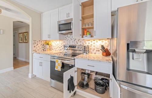 Convair Cove House | Waterfront Home with Dock | Heated Pool | 4.5 Blocks to Beach & Downtown
